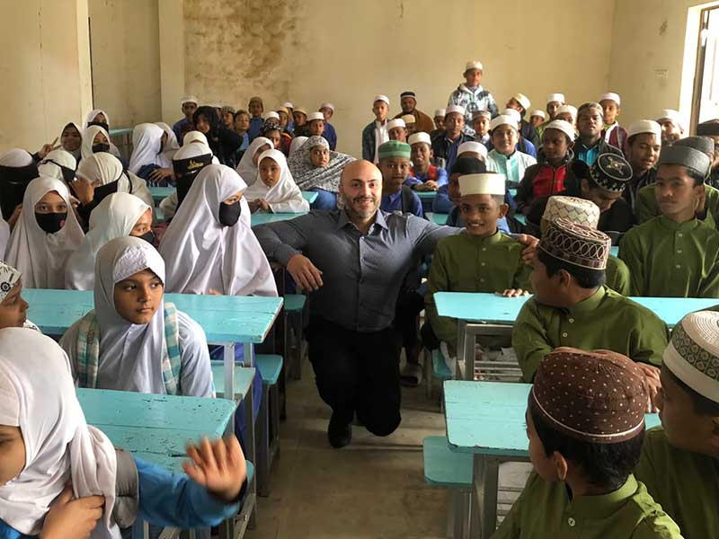 Abdul and a class of children